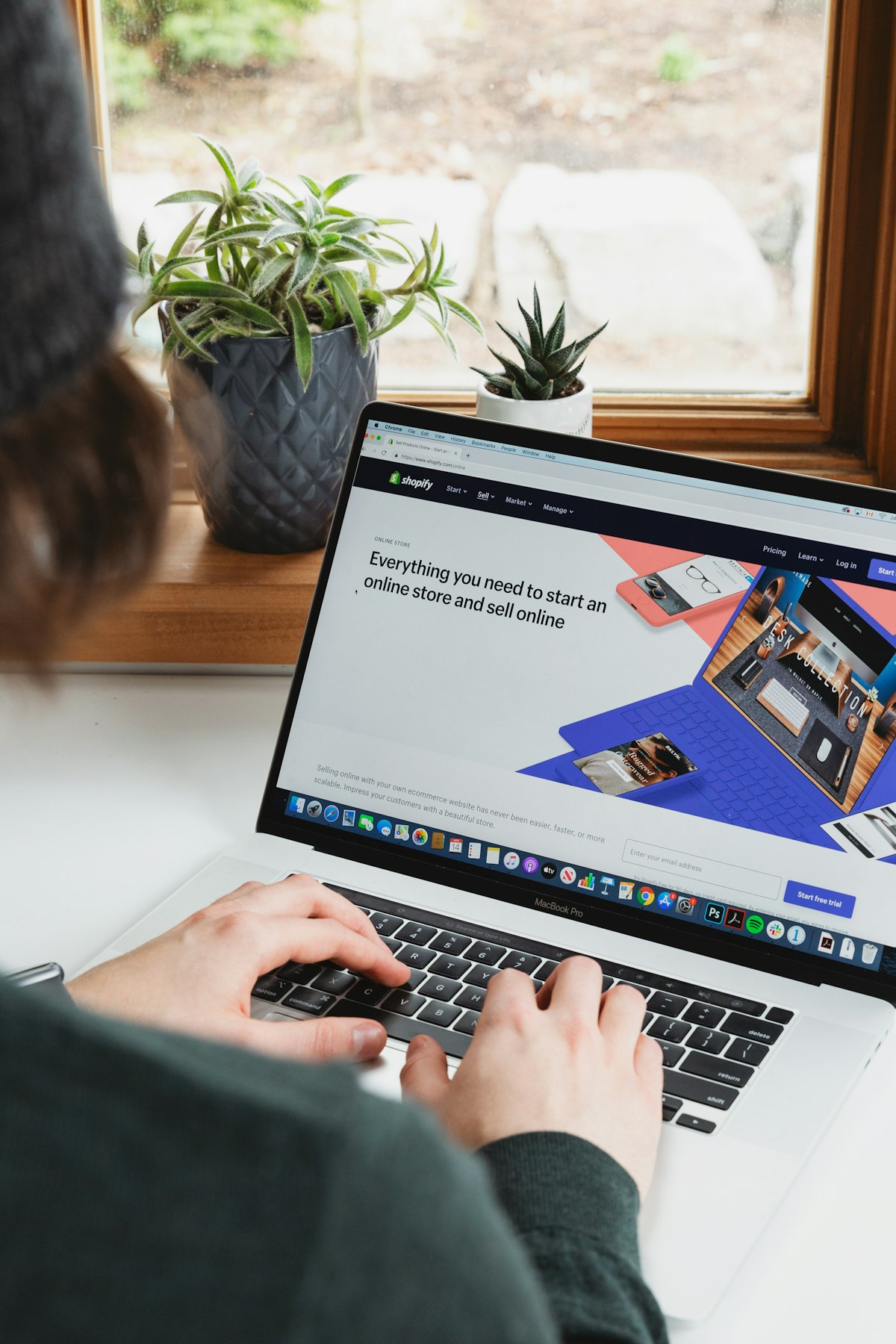 Local contractor reviewing their business website on a MacBook