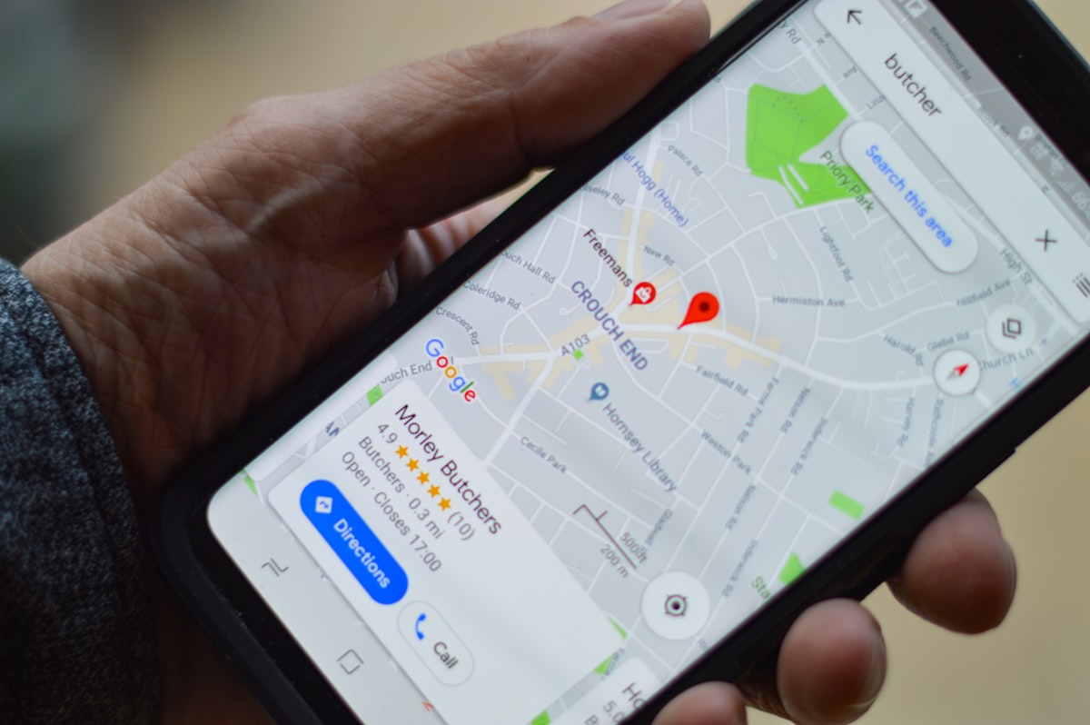 Person on smartphone searching for local businesses on Google in Austin TX